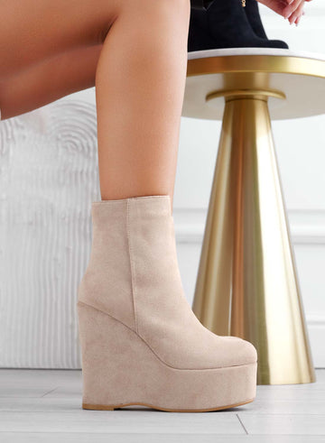 Beige suede ankle boots with wedge heel