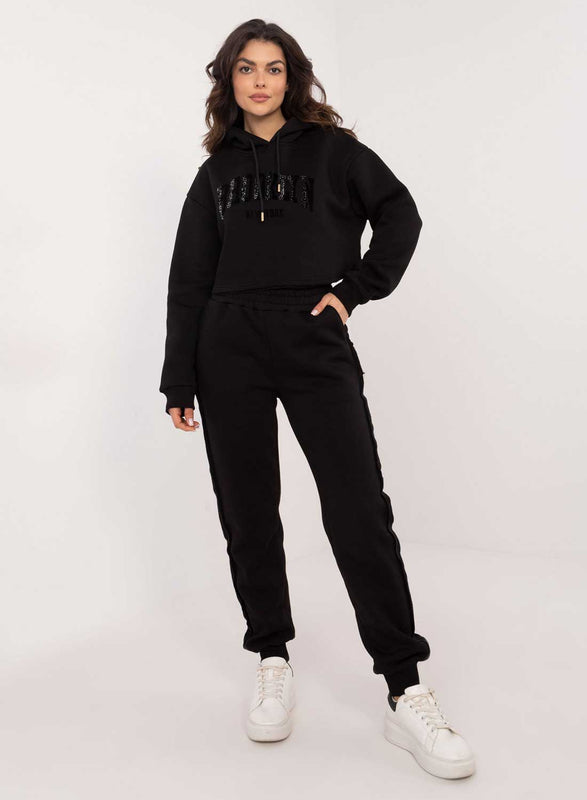 Tuta nera due pezzi felpata con scritta brooklyn