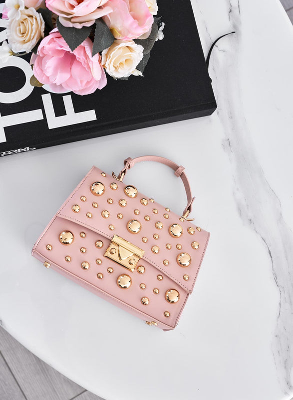 Bolso rosa con tachuelas de esfera dorada y bandolera B231