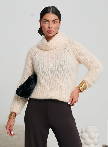 Soft and warm beige turtleneck sweater