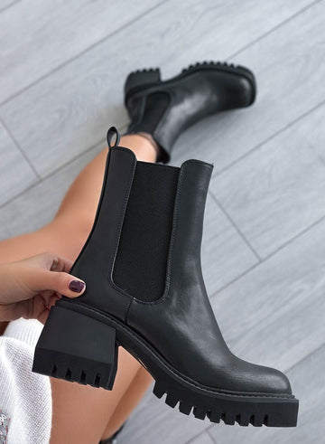 Black Alexoo ankle boots with side elastic