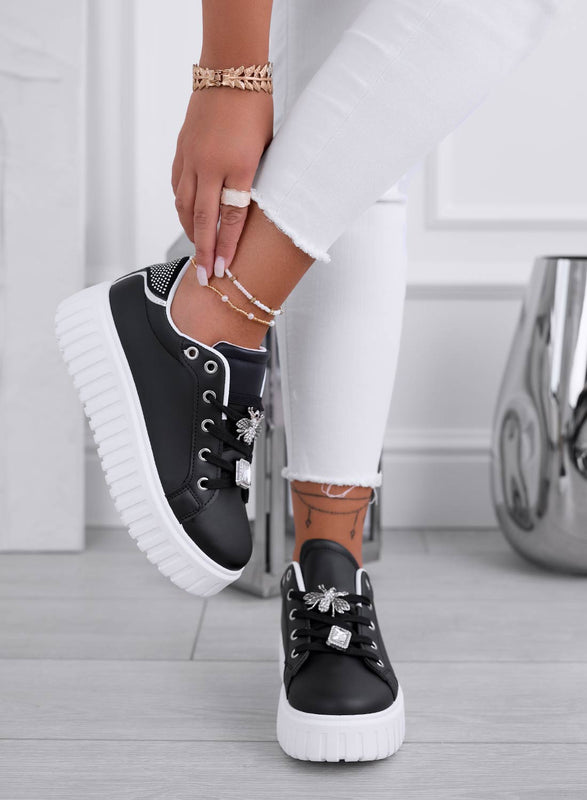 Zapatillas negras con adorno de abeja joya dorada