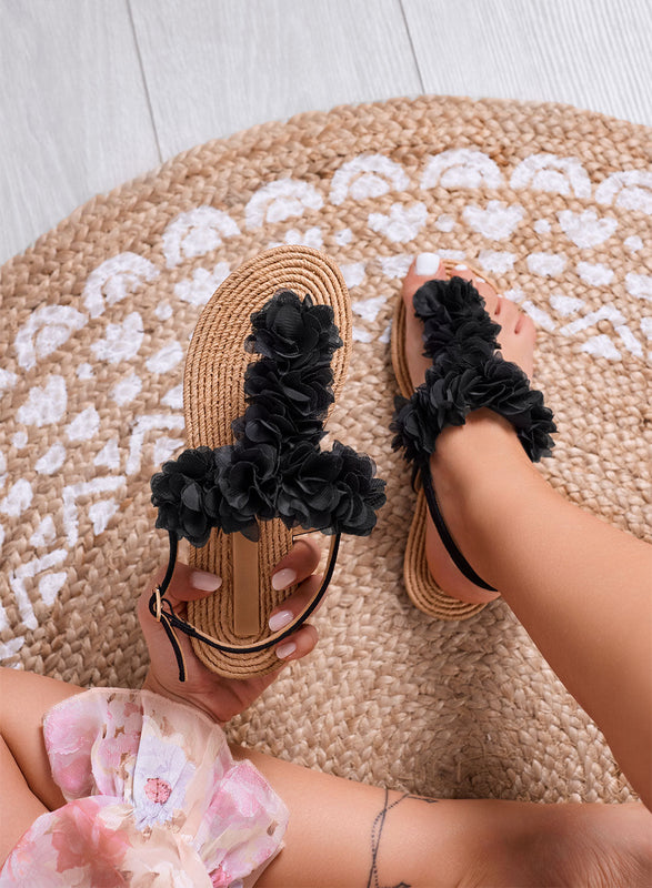 MENA - Sandalias negras tipo chanclas con aplicación de flores