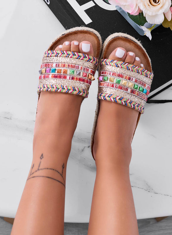 Beige slip-on sandals with wedge heel and multicolor studs