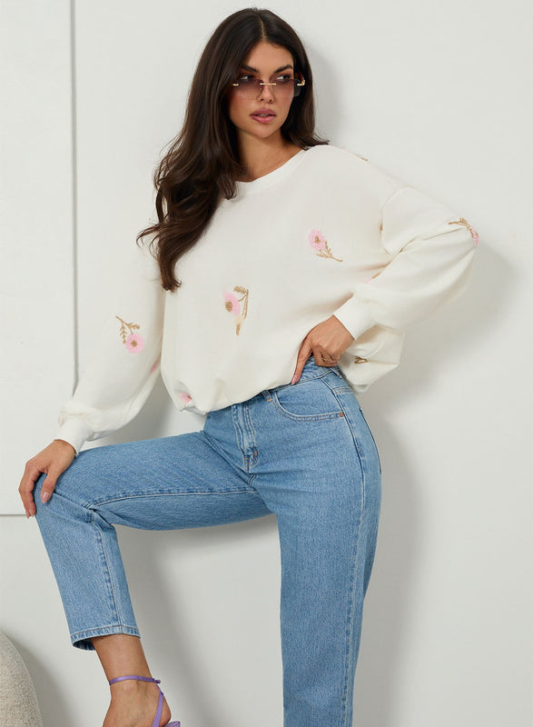 Oversized cream sweater with floral embroidery