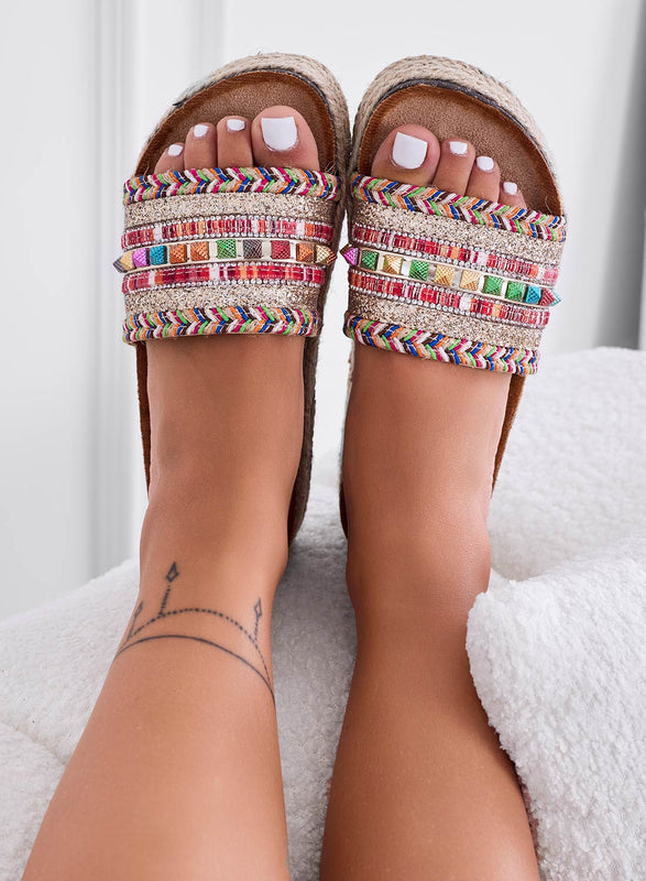 Beige slip-on sandals with wedge heel and multicolor studs