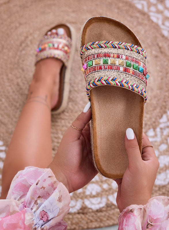 Beige slip-on sandals with wedge heel and multicolor studs