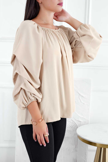 Beige blouse with ruched sleeves