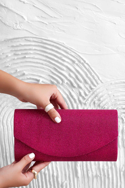 Bolso clutch fucsia B220 en tejido laminado