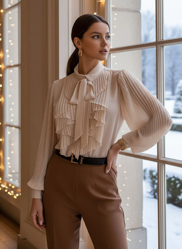 Beige shirt with ruffles and pleats