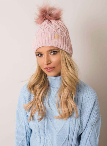 Bonnet rose matelassé avec pompon en fausse fourrure