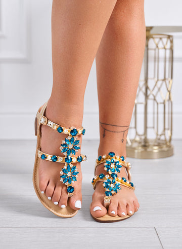 GIULY - Flat gold sandals with blue gemstone embellishments