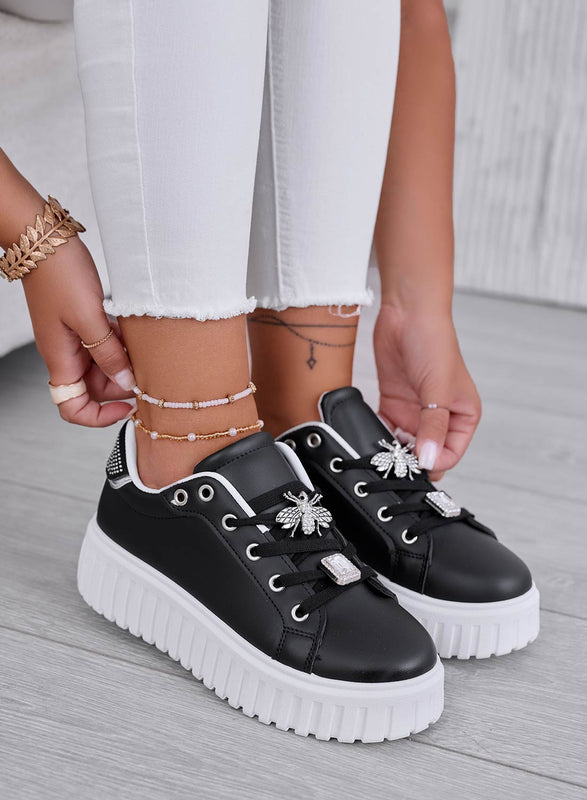 Zapatillas negras con adorno de abeja joya dorada