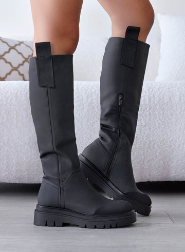 Black boots in waterproof fabric
