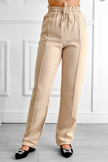 Pantalón beige con muelle y cordón en la cintura