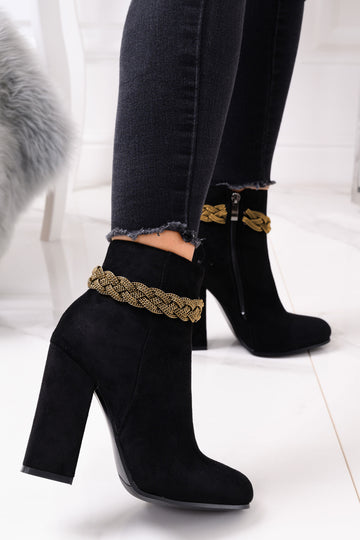 Black Alexoo ankle boots with gold jewel at the ankle