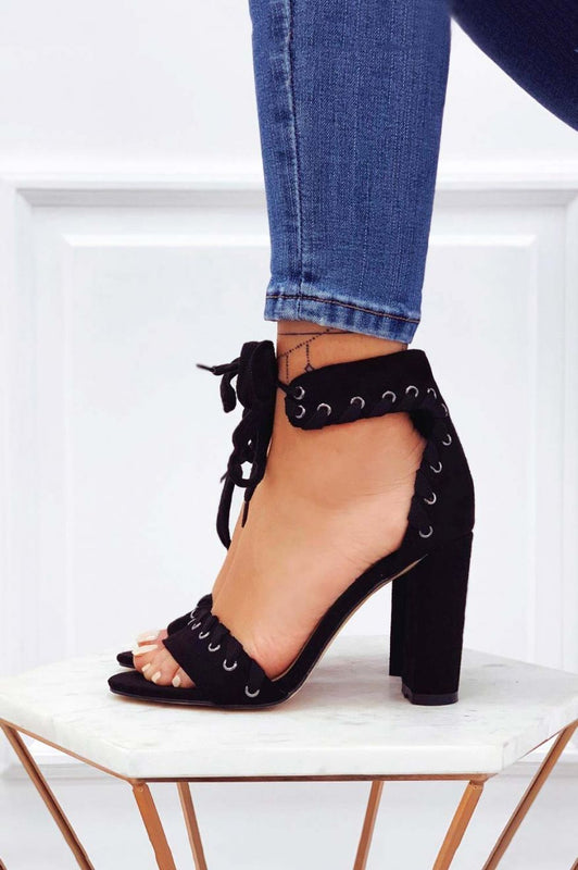 Black suede sandals with comfortable heel and strap