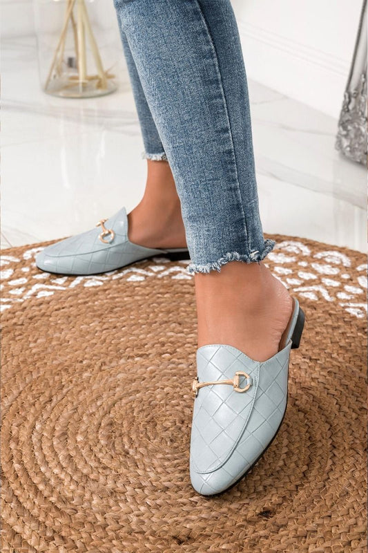 blue loafers with open back and checkered pattern