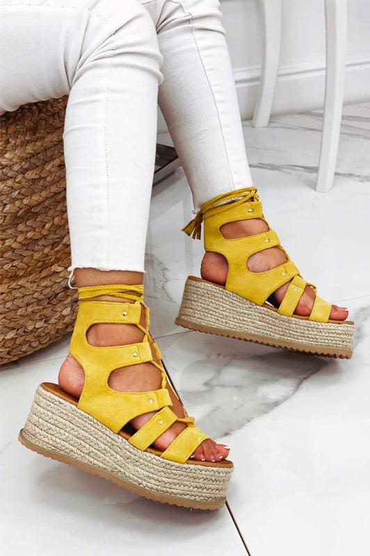 Yellow lace-up sandals with rope wedge