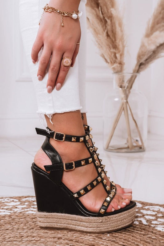 Black wedge sandals with laces and gold studs