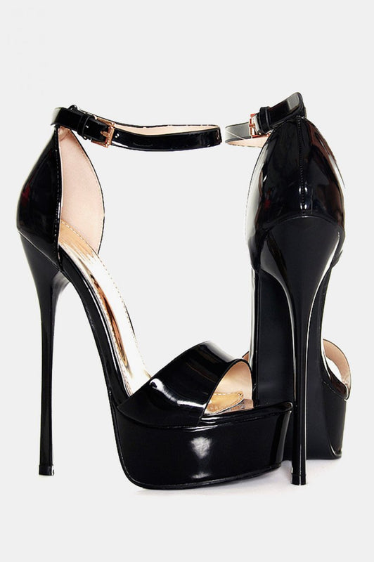 High-heeled patent leather sandals in black