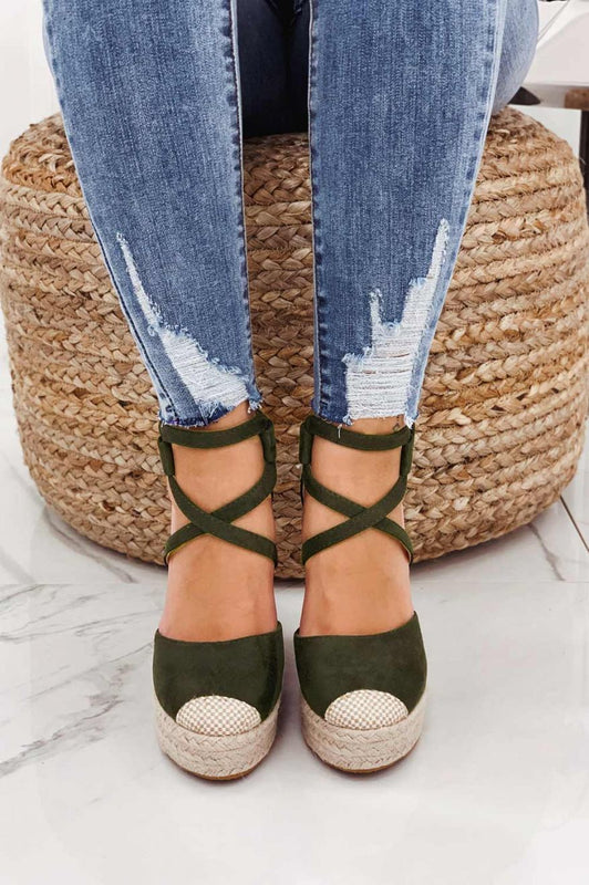 Green espadrilles with wedge heel and crossover straps