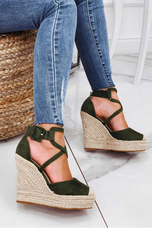 Green espadrilles with wedge heel and crossover straps