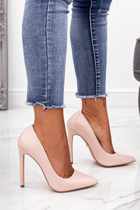 Pink faux leather pumps with high heel