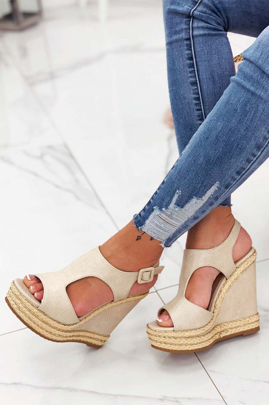 Beige wedge sandals with gold rope inserts