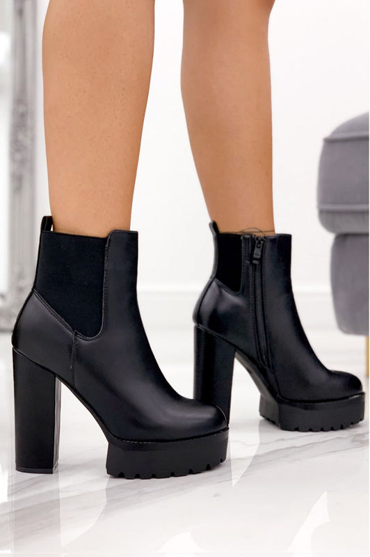 Bottines noires à talons hauts avec élastique latéral