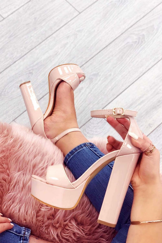 Nude patent leather sandals with high heel and ankle strap