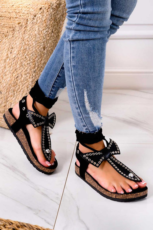 Sandalias negras tipo chancla con lazo y cordones al tobillo