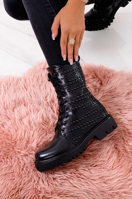 Black combat ankle boots with studs