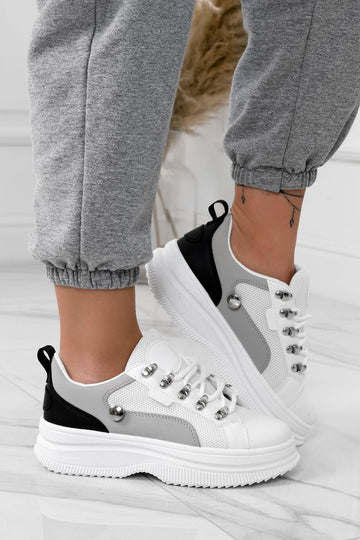 White sneakers with contrasting panels and silver hooks