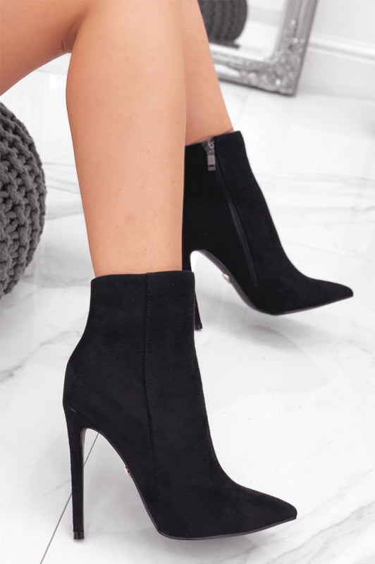 Black suede ankle boots with high heel