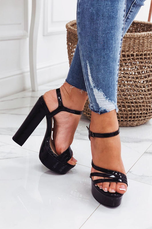 Black patent leather sandals with high heel