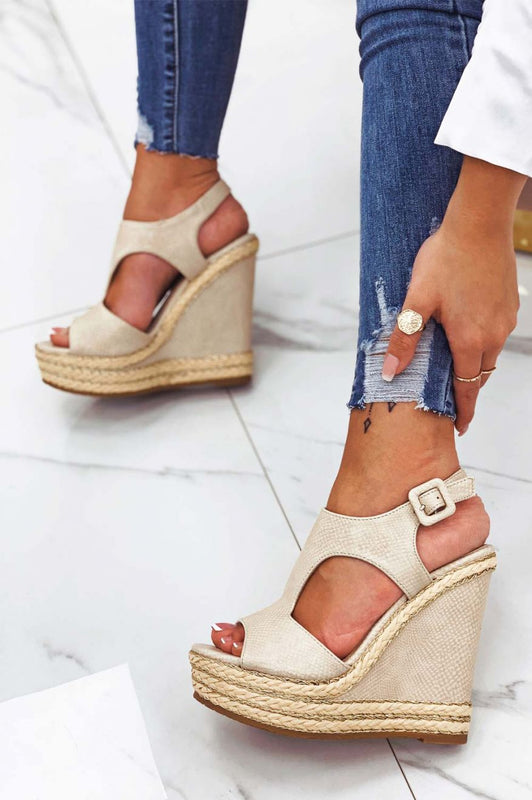 Beige wedge sandals with gold rope inserts