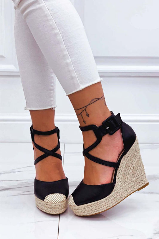 Black faux leather espadrilles with wedge heel and crossover straps