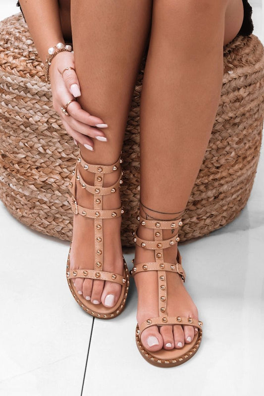 Beige flat sandals with gold sphere studs