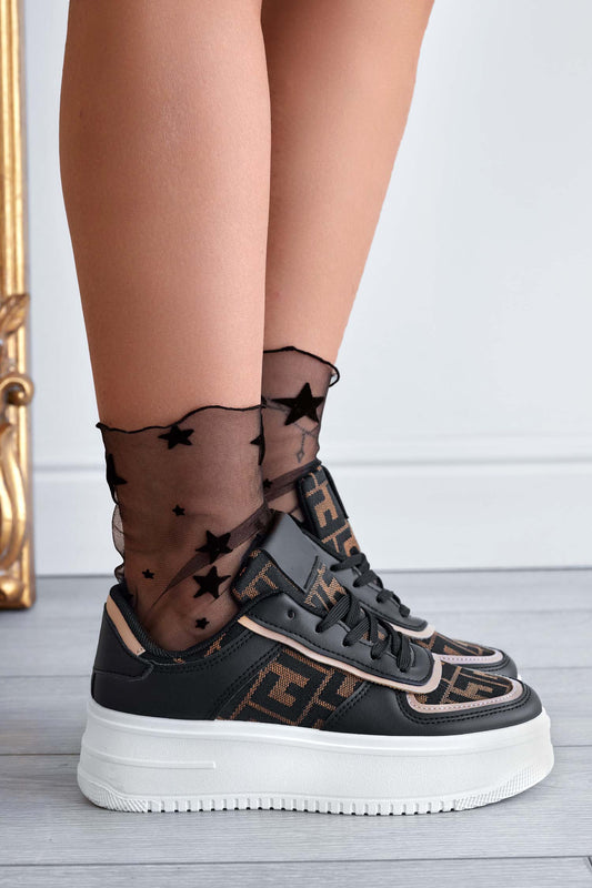 Black sneakers with patterned fabric inserts