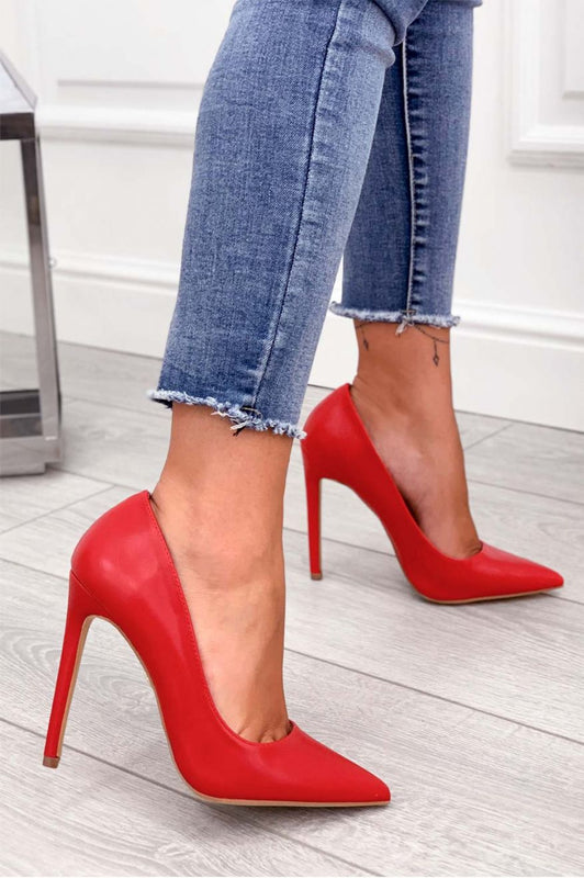 Red faux leather pumps with high heel