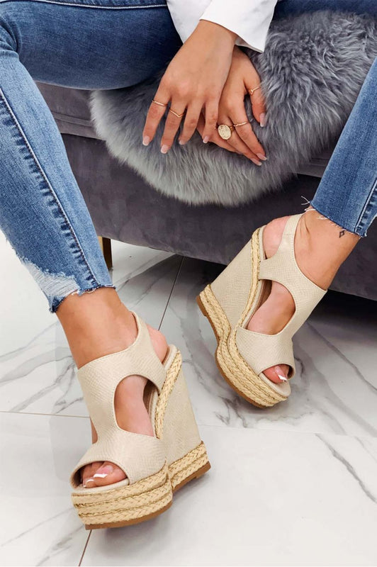 Beige wedge sandals with gold rope inserts