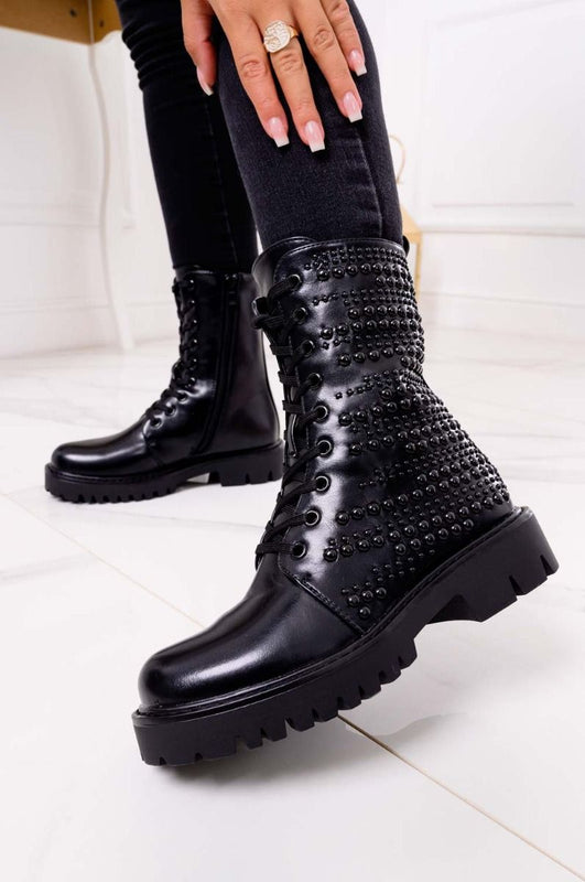 Black combat ankle boots with studs
