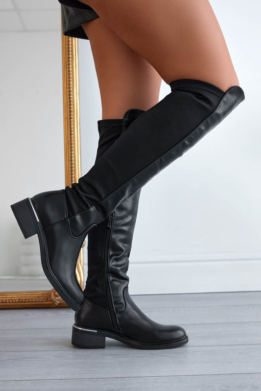 Botas negras por encima de la rodilla con tejido elástico en la parte trasera