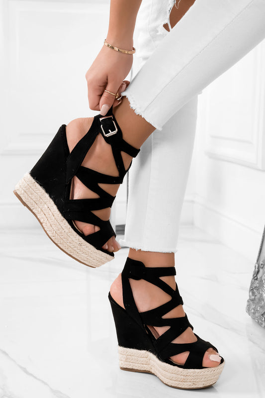 Sandali neri fasciati con zeppa