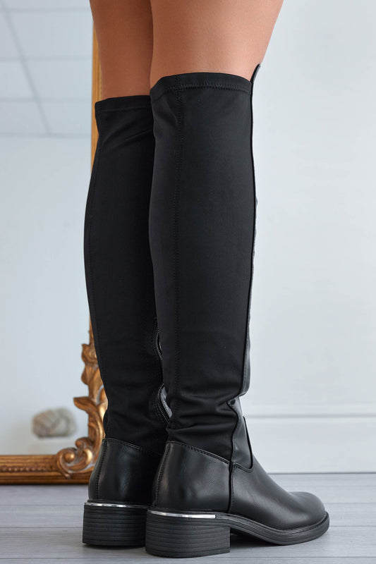 Botas negras por encima de la rodilla con tejido elástico en la parte trasera