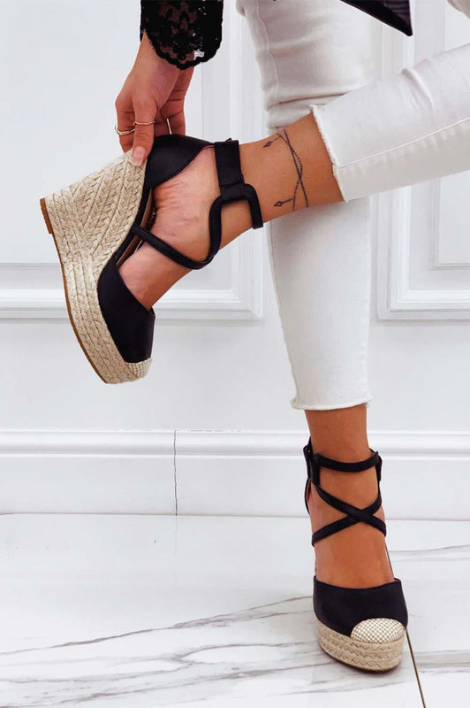 Black faux leather espadrilles with wedge heel and crossover straps