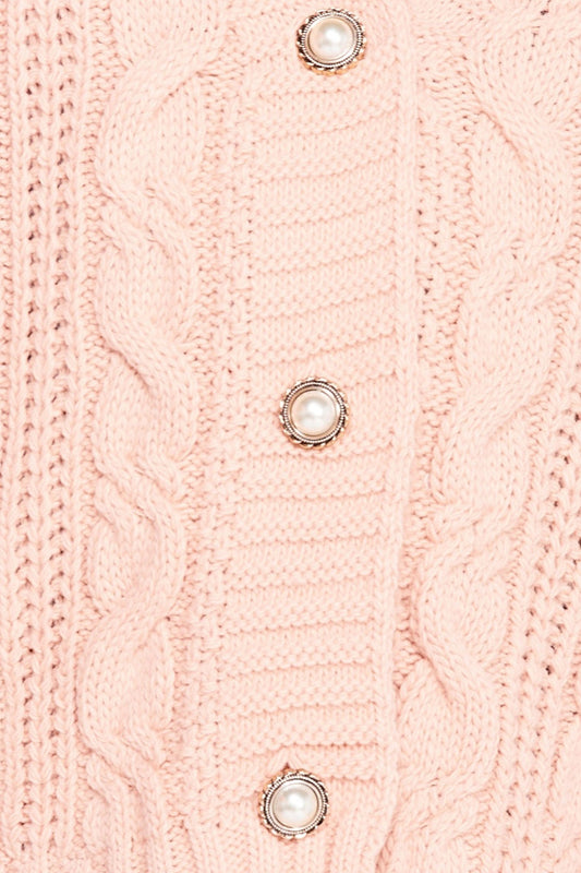 Cardigan rosa de punto con botones de perlas