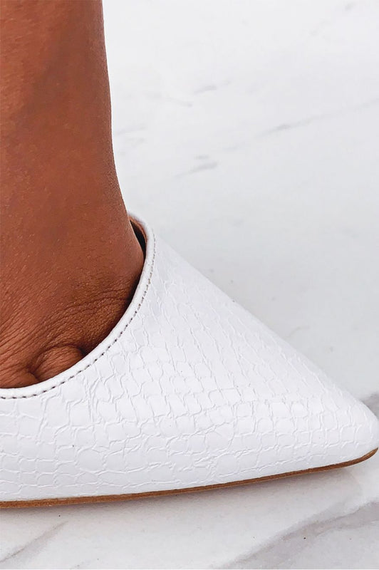 Decolletè bianche effetto pitonato con tacco alto