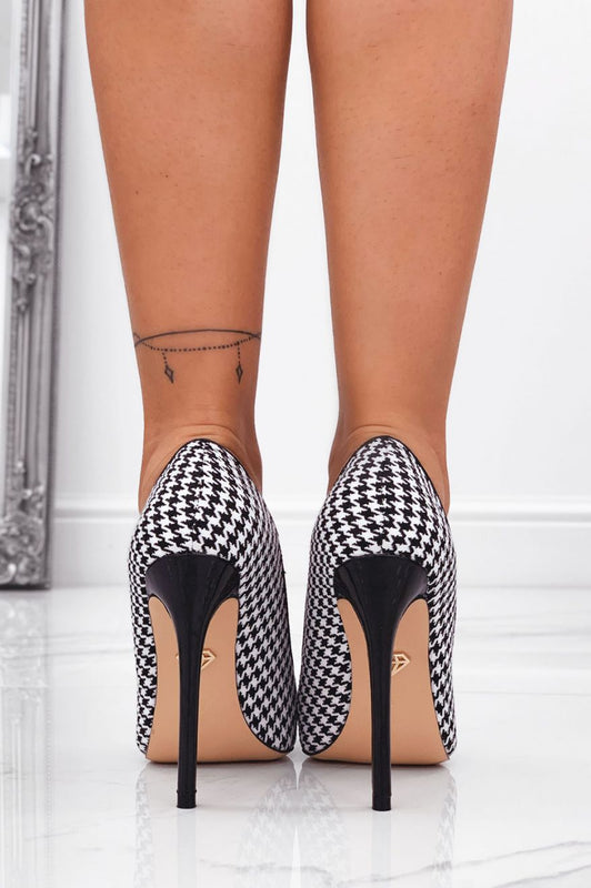 Black houndstooth pumps with patent leather heel and toe